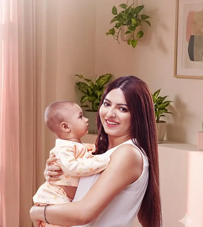 Happy parents holding a newborn baby